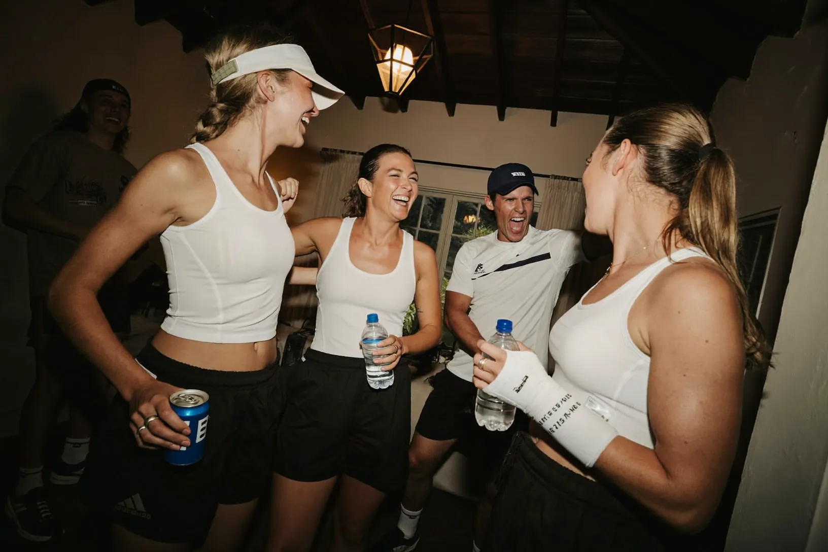 Group of athletes in white shirts