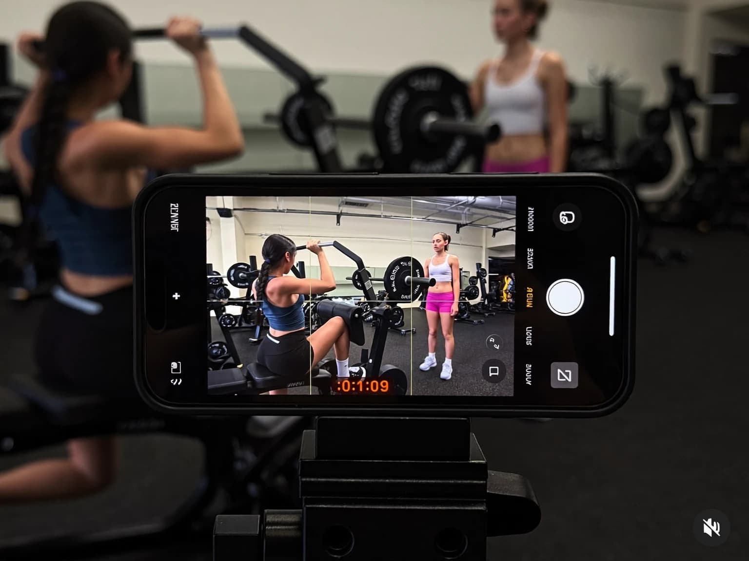 Athlete recording a form check with a phone on a tripod