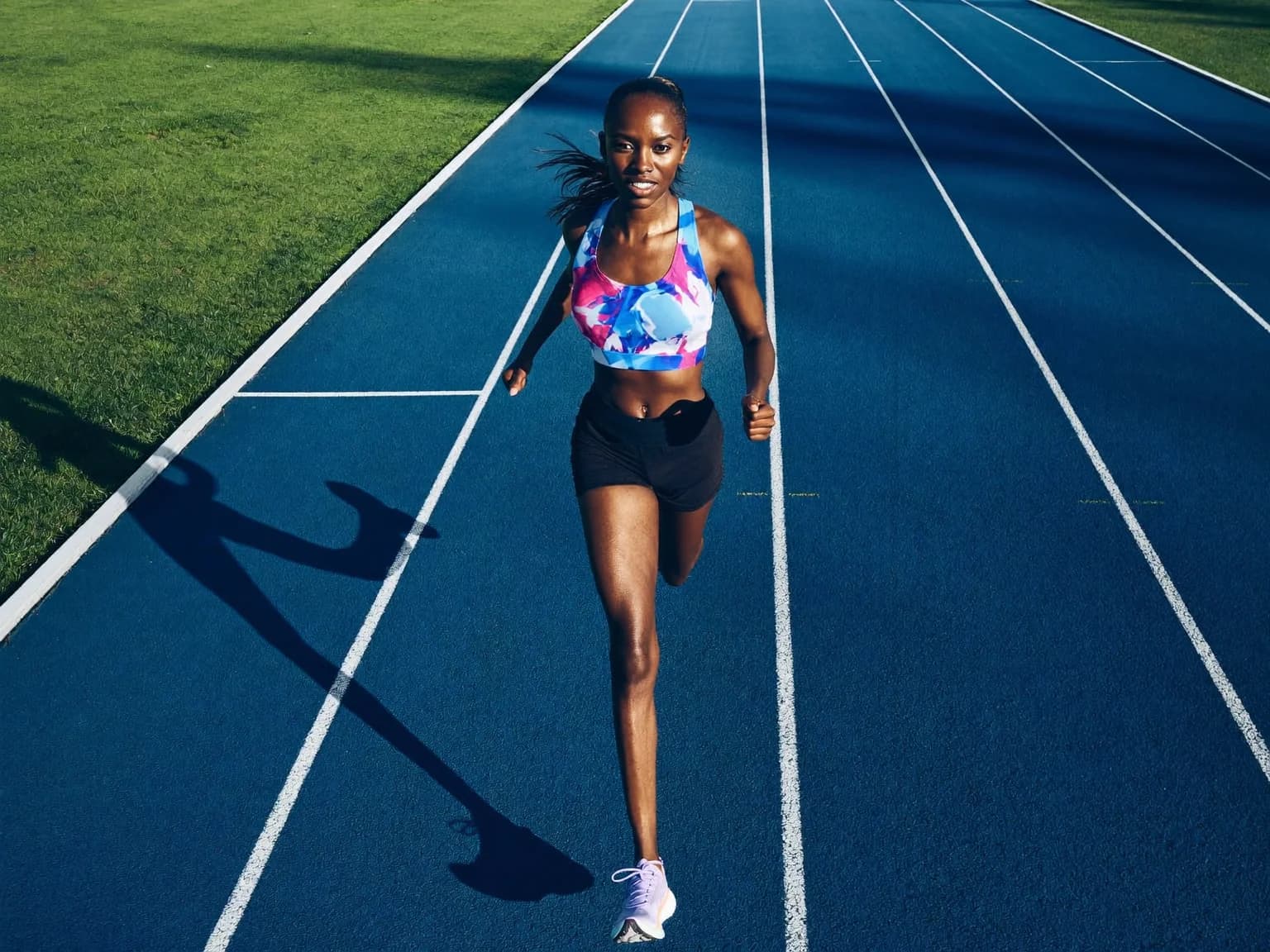 Athlete running on track